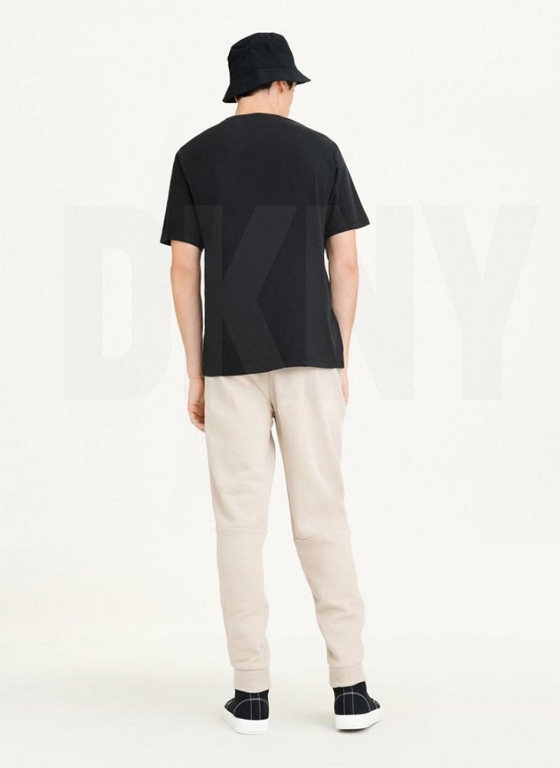 Black Men's DKNY Stamped Logo T Shirts | Australia-D0923