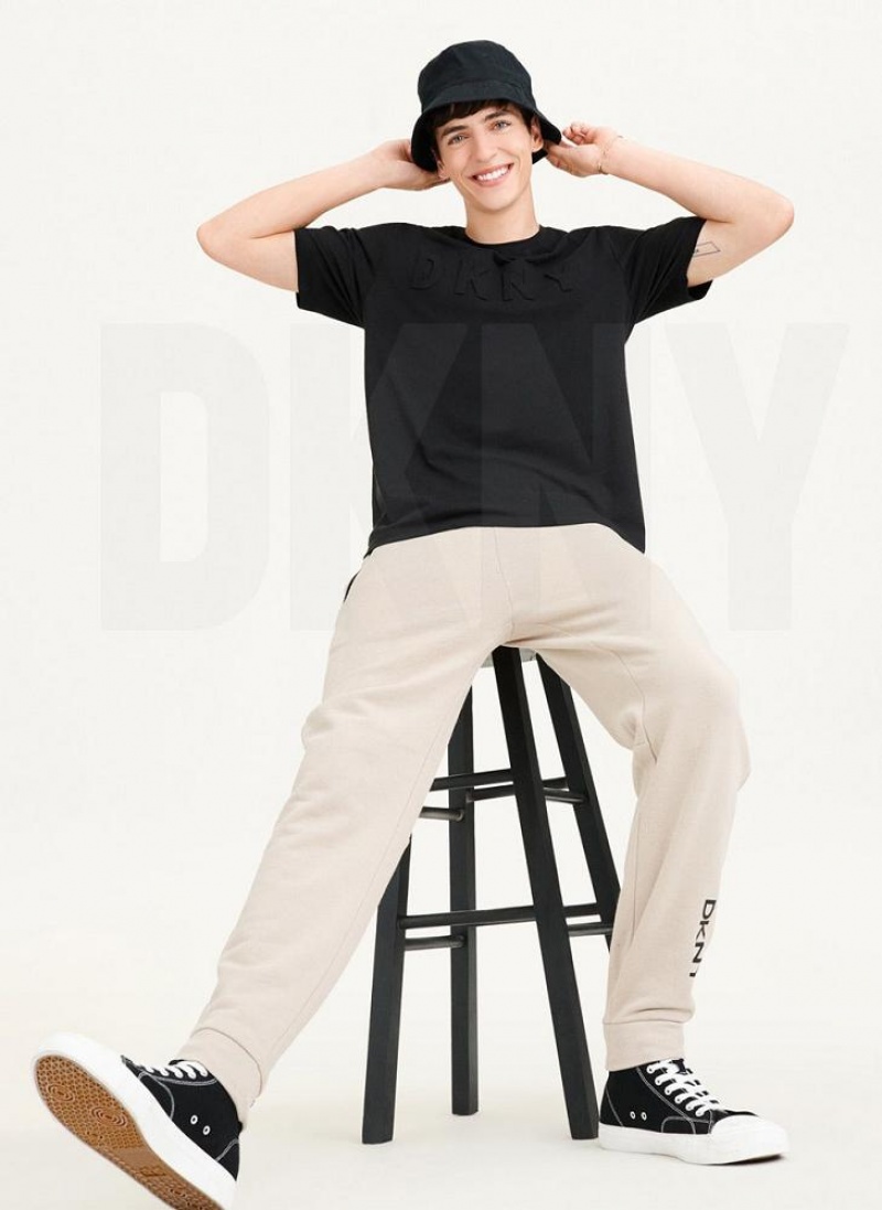 Black Men's DKNY Stamped Logo T Shirts | Australia-D0923