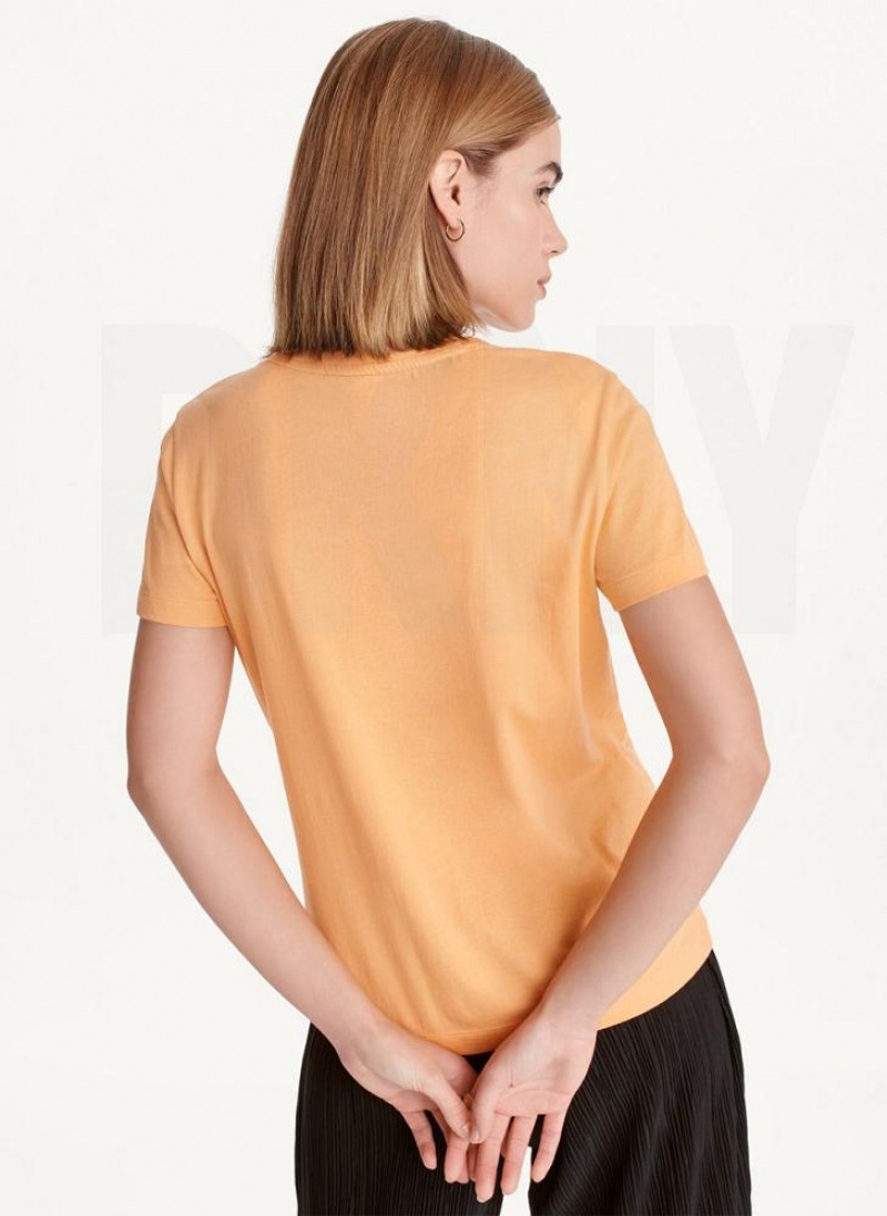 Yellow Women's DKNY Short Sleeve Embossed Logo T Shirts | Australia-D1302